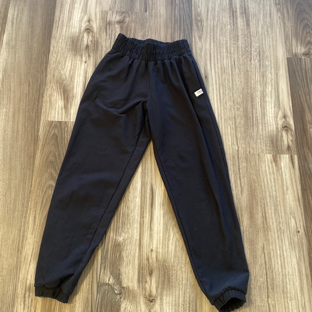 Five jogger pants.  Worn once